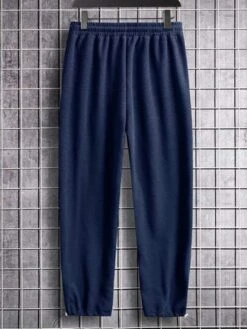 Manfinity Hypemode Men Solid Straight Leg Pants