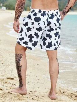 Men Cow Print Drawstring Waist Swim Trunks