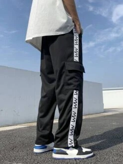 Manfinity Sporsity Men Letter Graphic Flap Pocket Side Drawstring Waist Sweatpants