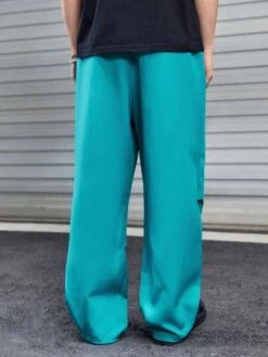 Manfinity Unisex 1pc Solid Slant Pocket Wide Leg Pants