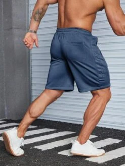 Manfinity Homme Men Drawstring Waist Zip Pocket Side Shorts